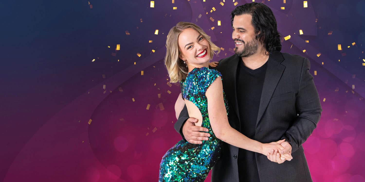 Young couple dancing for the holiday season